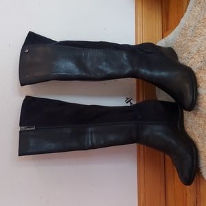 Knee high boots in good quality that are 55 dollars less than original price.